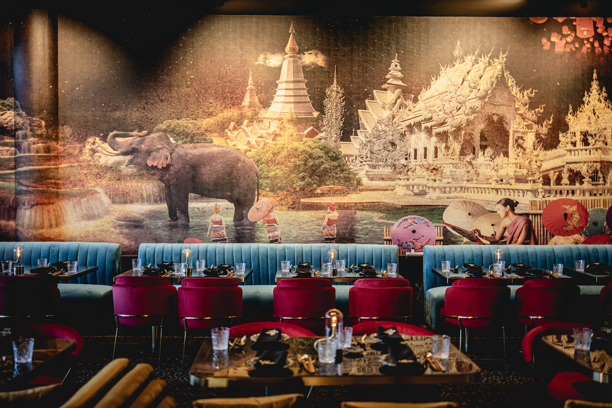 Hand-painted murals wow in MaKiin's dining room. | Photo by MaKiin