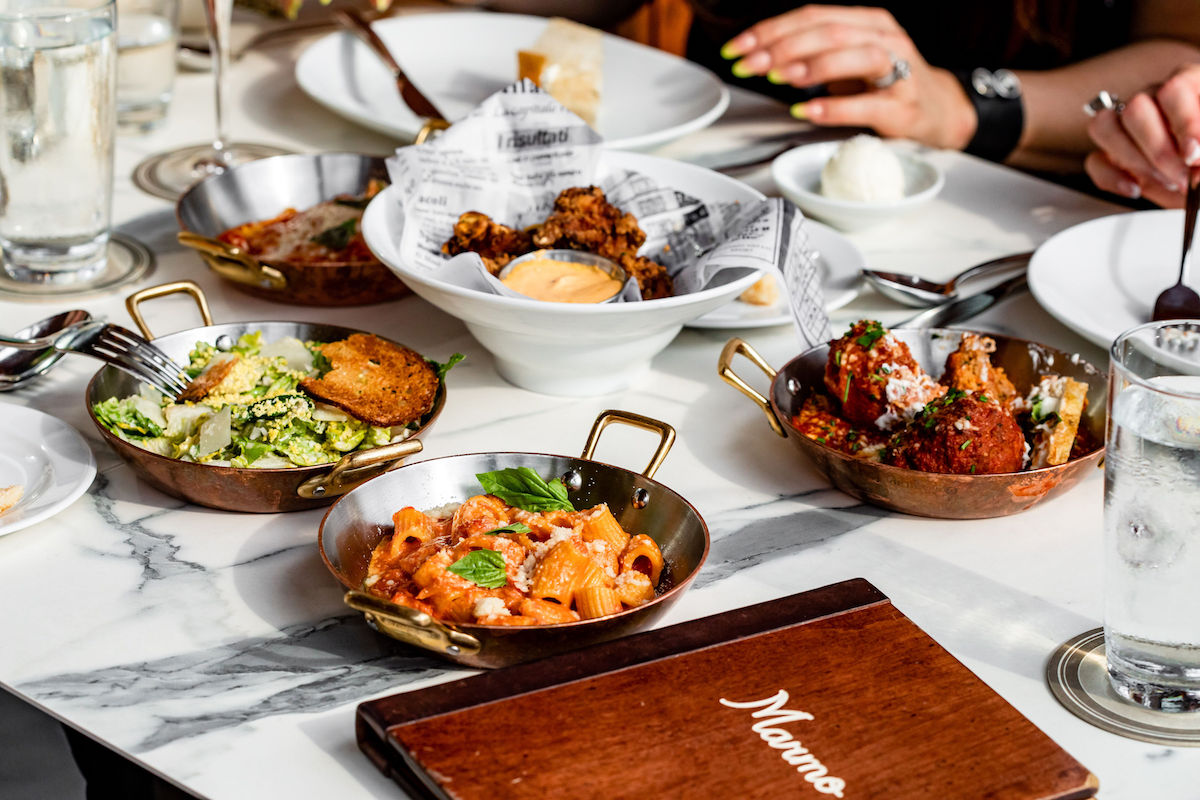 A spread of happy hour dishes at Marmo. | Photo by Kirsten Gilliam