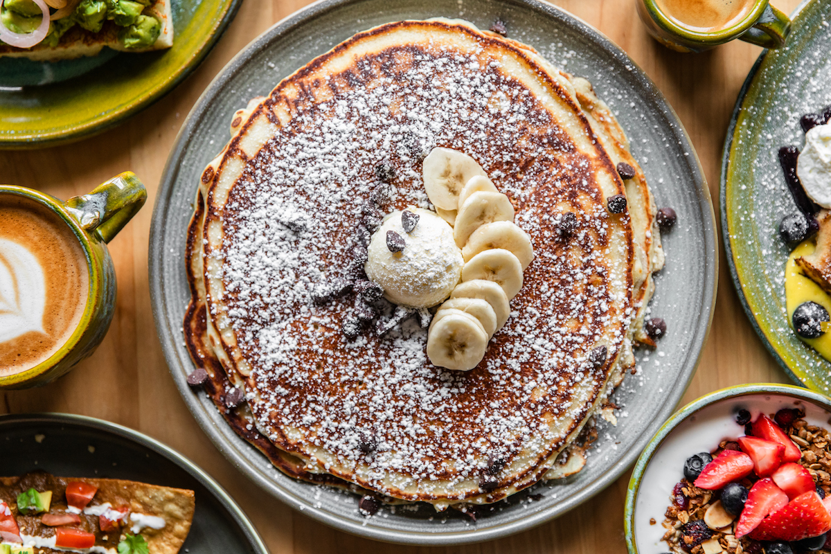 Dandelion Cafe's oversized buttermilk pancakes. | Photo by Becca Wright