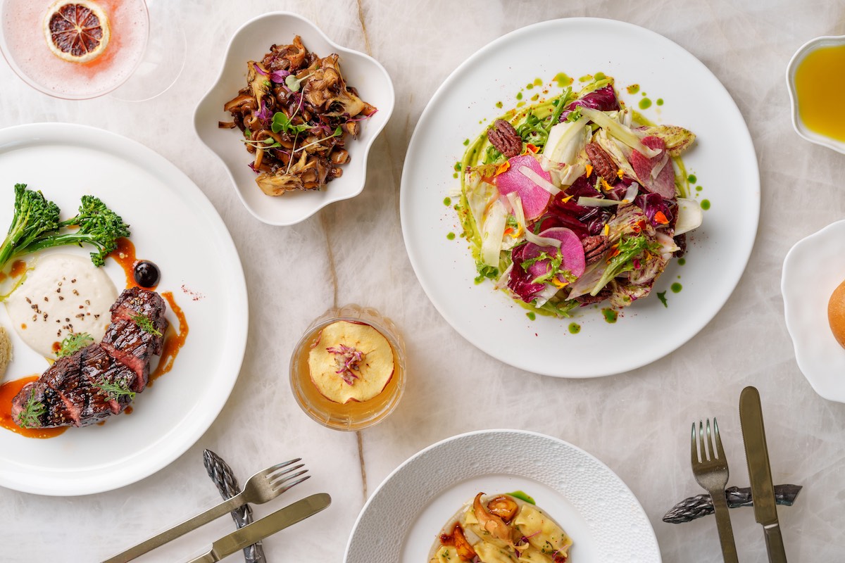 A spread of dishes from Le Jardinier's New Year's Eve menu. | Photo by Brian Kennedy