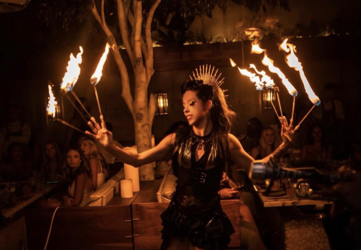 Toca Madera's signature fire dancers. | Photo by TJ Perez