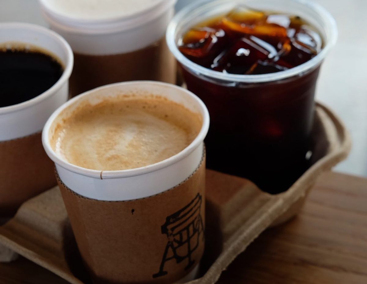 476466707_2263014854098438_9155245956096764162_n - DiningOut Houston A loaded coffee carrier showcasing hot beverages at Giant Leap Coffee. | Photo by Giant Leap Coffee