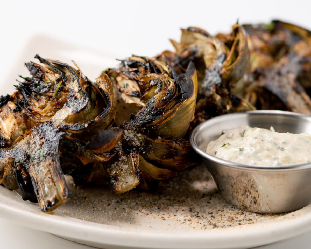IMG_6789 - DiningOut Houston The famed fire-grilled artichoke at J. Alexander's. | Photo by J. Alexander's