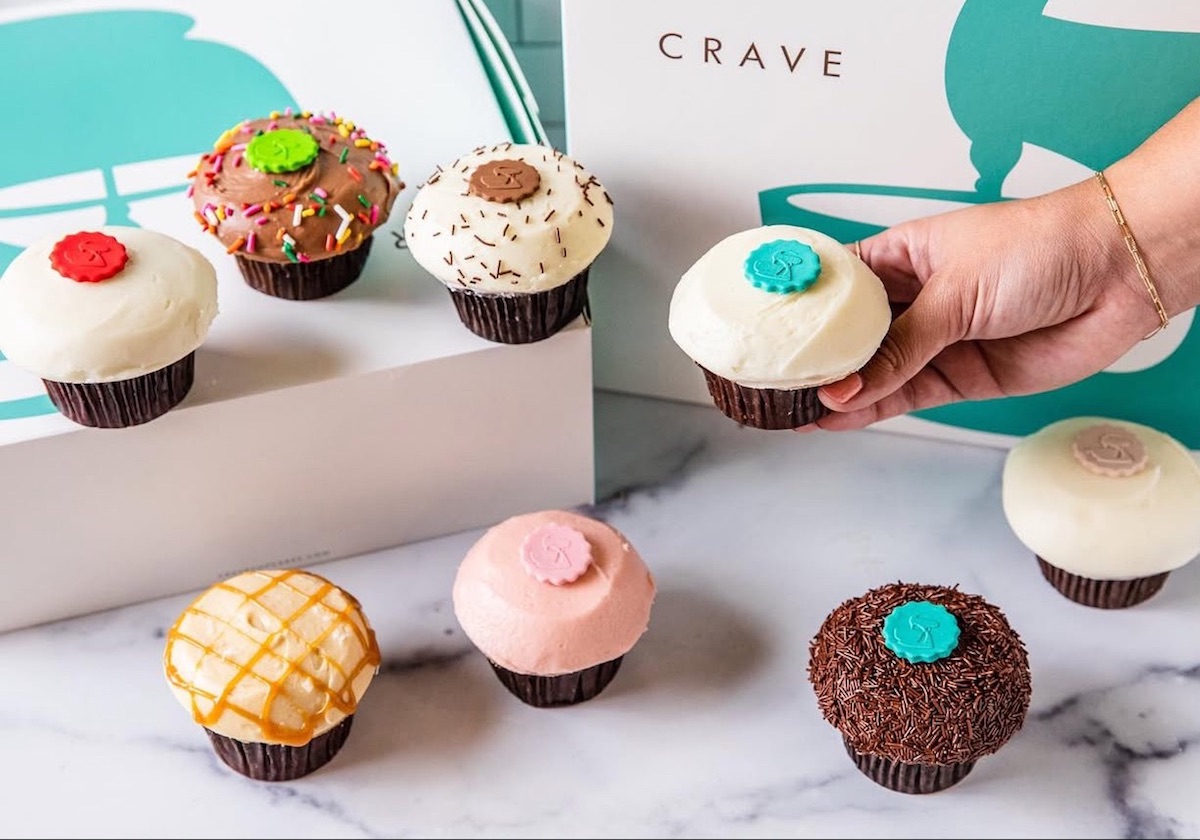 Screenshot 2025-08-26 at 112543 AM - DiningOut Houston A spread of Crave's best-selling cupcakes. | Photo by Crave Cupcakes