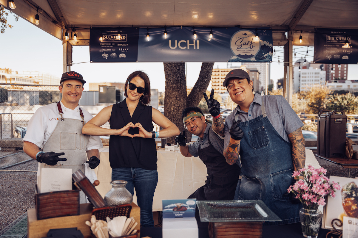 The Uchi team holding court within Surf, Rare's exclusive VIP seafood experience. | Photo by Swizzle Media