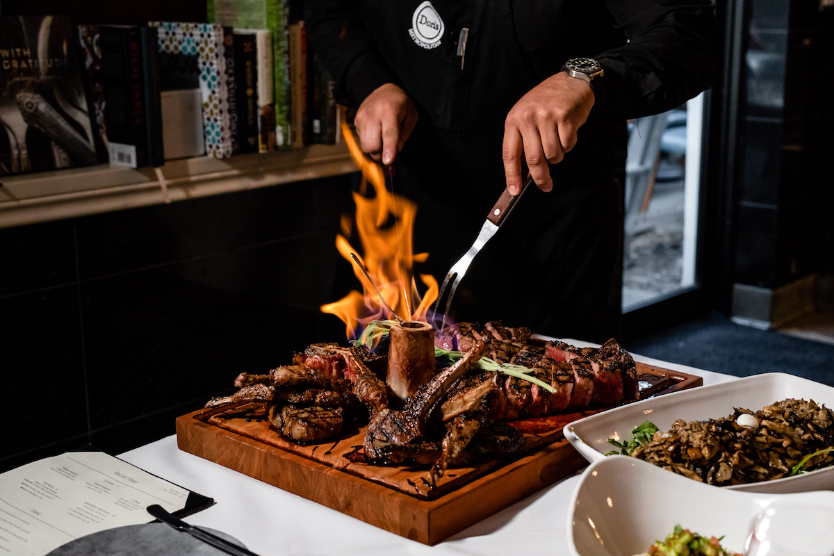 Meat board set aflame at Doris Metropolitan. | Photo by Kirsten Gilliam