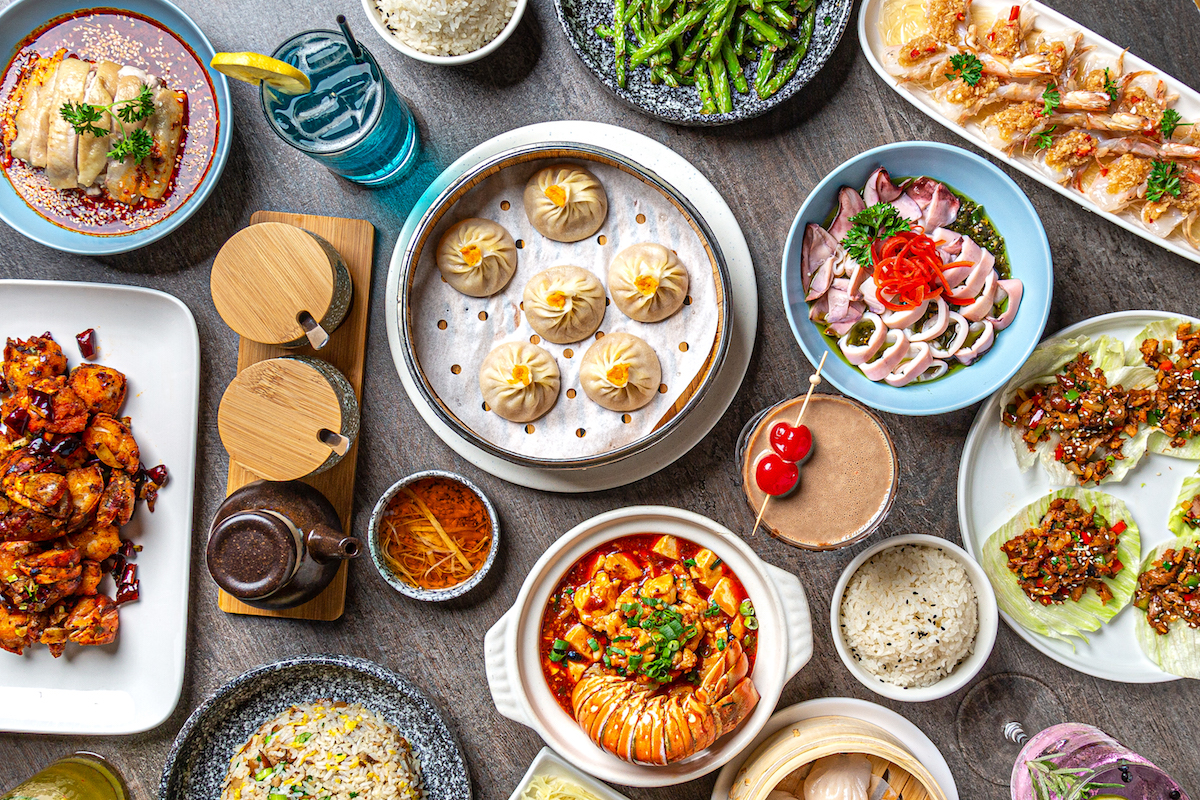 A spread of dim sum and entrees at Duck N Bao. | Photo by Jenn Duncan