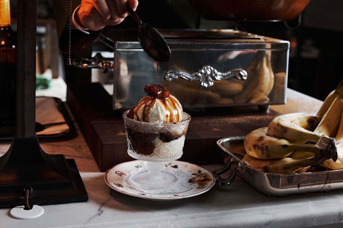 Bananas foster getting its finishing touches at State of Grace. | Photo by Andrew Thomas Lee