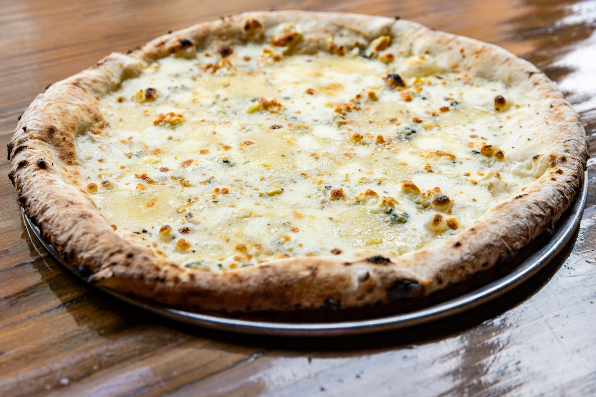Pizaros 042723Pizaros 042723 - DiningOut Houston New York-style cheese pizza at Pizaro's. | Photo by Emily Jaschke