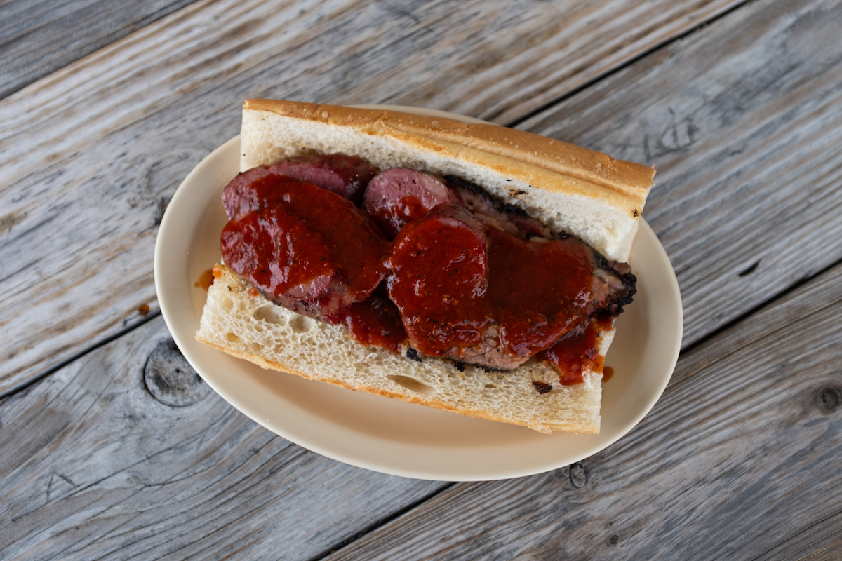 Goode Co - DiningOut Houston Goode Co. Barbecue’s famous barbecue meats can be enjoyed in barbecue po’boys, including brisket, turkey, sausage, ham or a meat combo. | Photo by Goode Co.