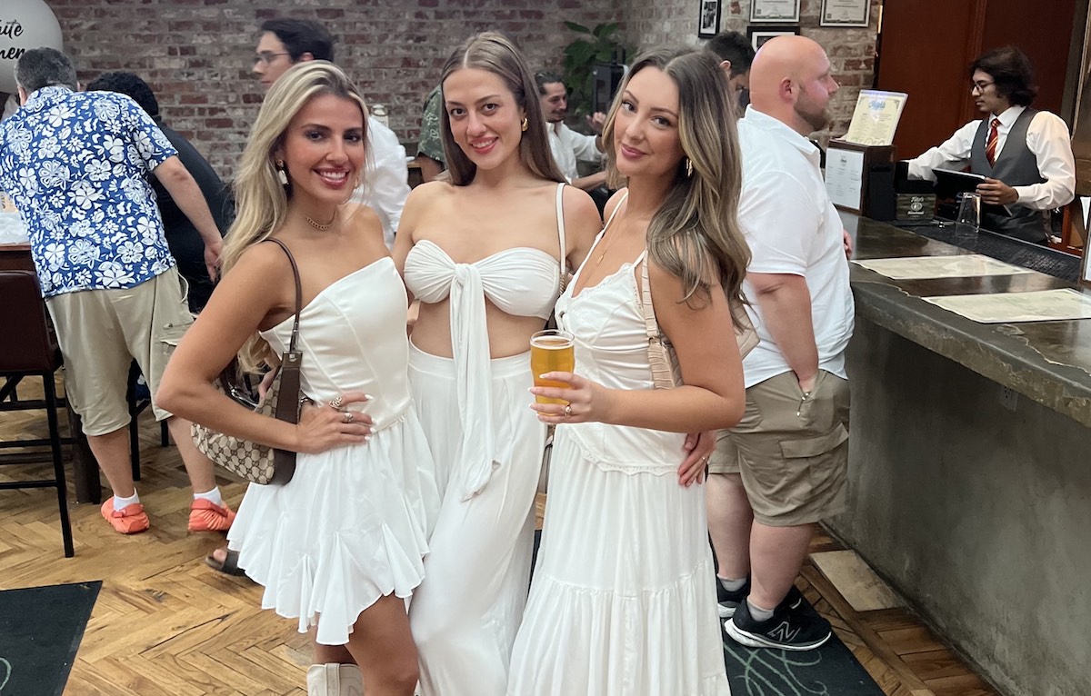 Heights Bier Garten White Linen Night_Emily Vitek - DiningOut Houston White Linen Night in the Heights partygoers at Heights Bier Garten. | Photo by Emily Vitek