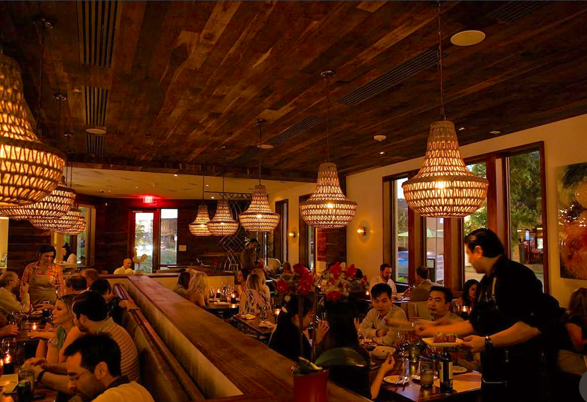 IMG_4736 - DiningOut Houston The moody, low-lit dining room at Oporto. | Photo by Oporto