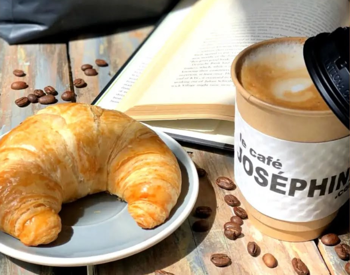 Latte and a croissant at Le Cafe Josephine. | Photo by Le Cafe Josephine
