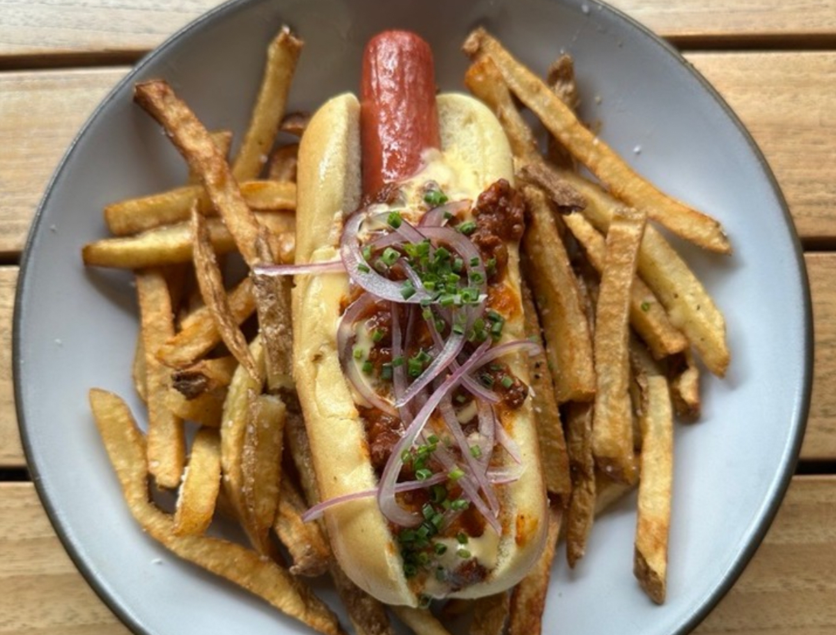 IMG_8226 - DiningOut Houston Wagyu beef hot dog and fries at Bayou & Bottle. | Four Seasons Houston