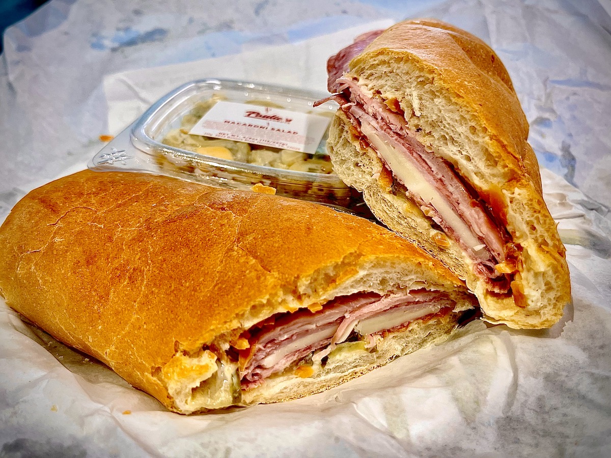Paulies - DiningOut Houston The Supreme Po’Boy at Paulie’s Poboy’s is loaded with imported ham, salami and provolone with signature chow chow and pickles. | Photo by Greg Morago