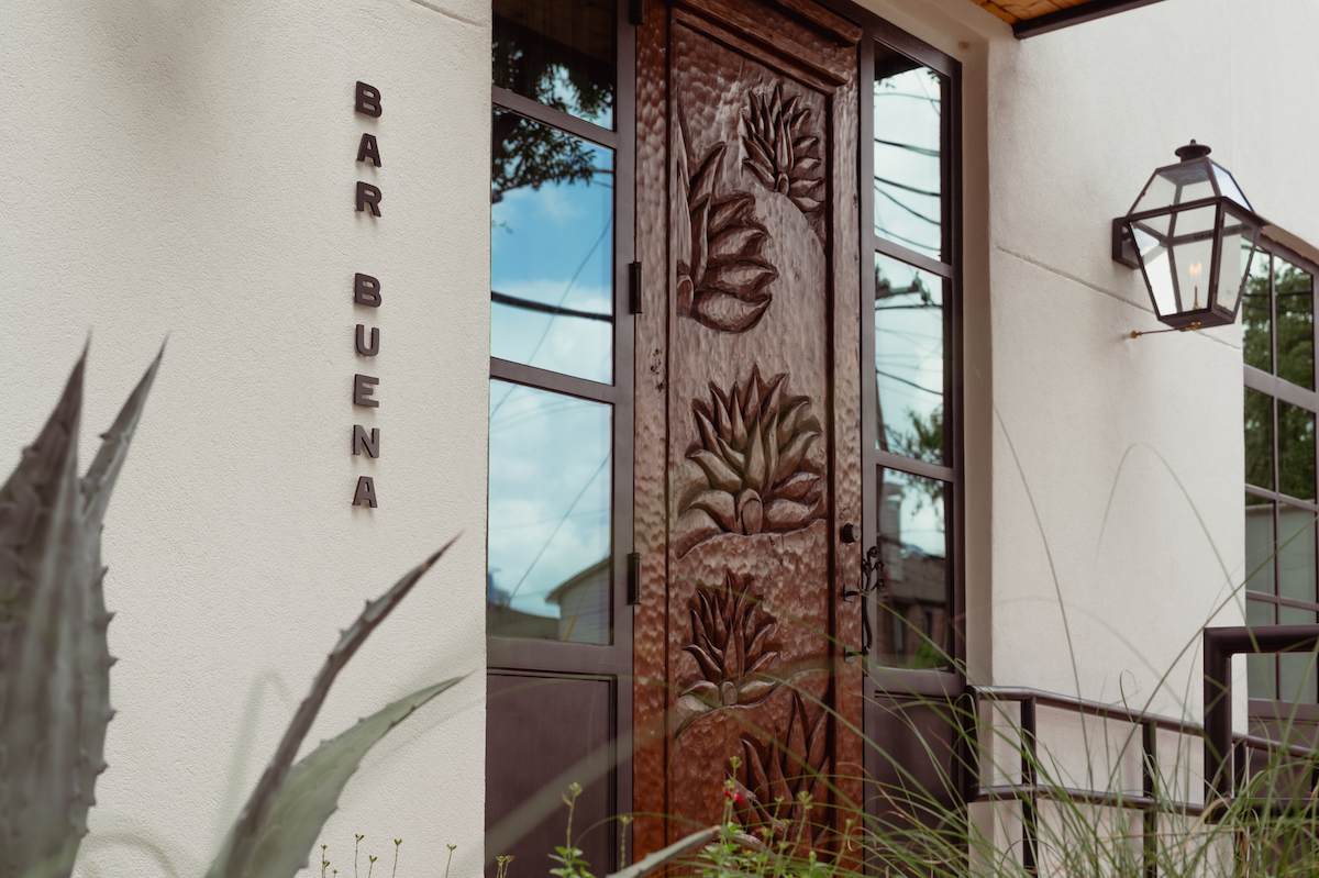 S1071056 - DiningOut Houston Bar Buena's entrance on McDuffie Street. | Photo by Goode Co.