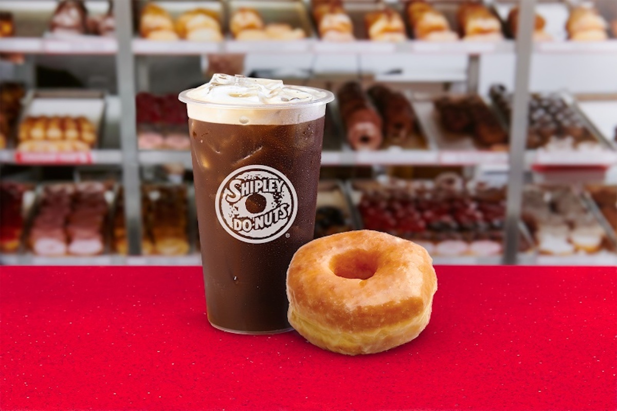A classic glazed doughnut with ice coffee at Shipley Do-Nuts. | Photo by Shipley Do-Nuts