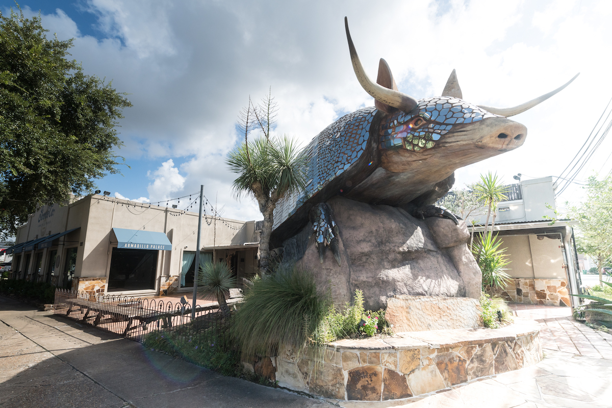 A giant armadillo greets visitors at the entrance to Goode Co. Armadillo Palace. | Photo by Goode Co.