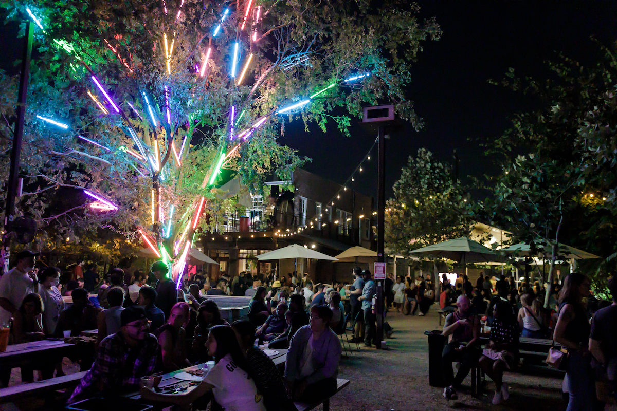 The sprawling patio at Axelrad after dark. | Photo by Tommy Middleton
