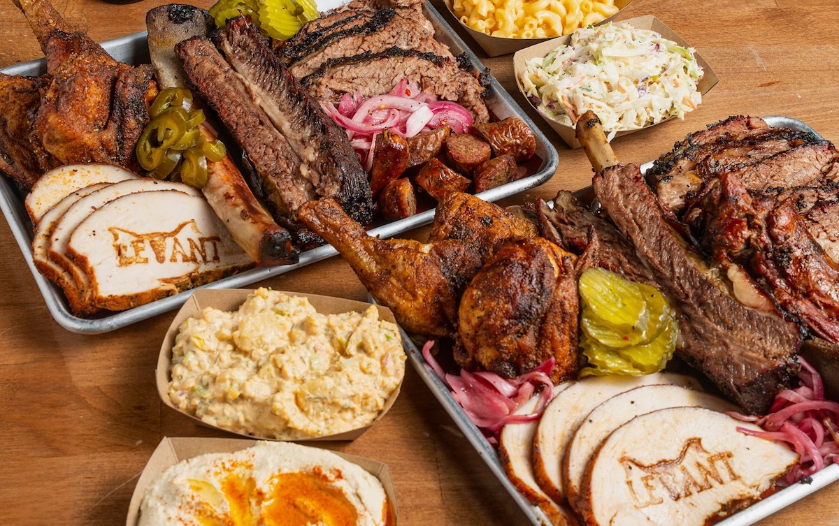 Levant - DiningOut Houston A striking spread of meats and sides at Levant BBQ. | Photo by Levant BBQ
