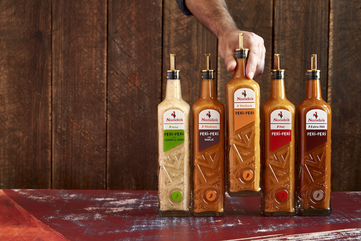 A variety of Peri Peri table sauces at Nando's. | Photo by Nando's
