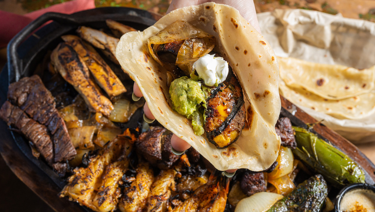 Beef and chicken fajitas at Candente. | Photo by Duc Hoang