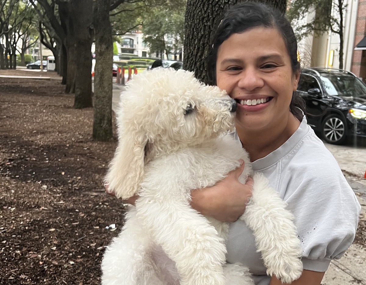 Chef Patti Delgado of the Original Ninfa's with her standard poodle Nube. | Photo courtesy of Patti Delgado