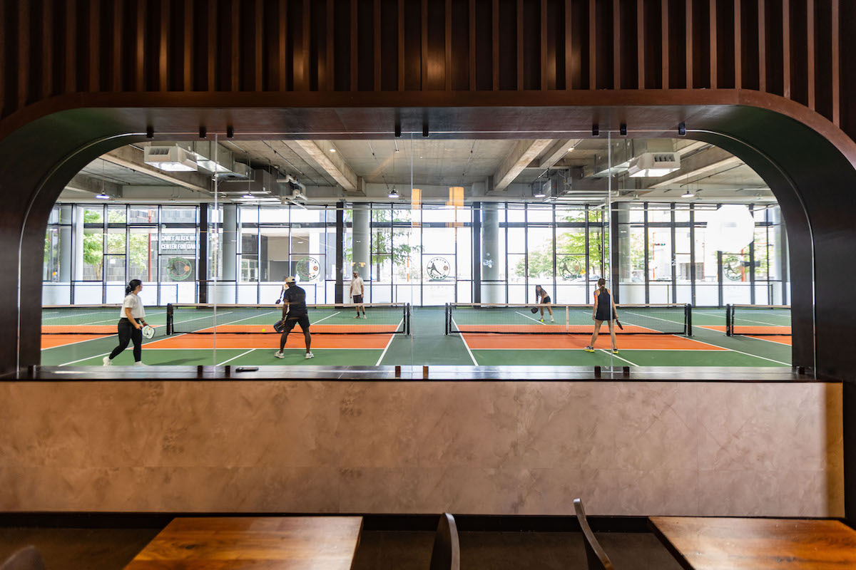 Indoor pickleball courts at Pickle Mania inside Lyric Market. | Photo by Andrew Hemingway